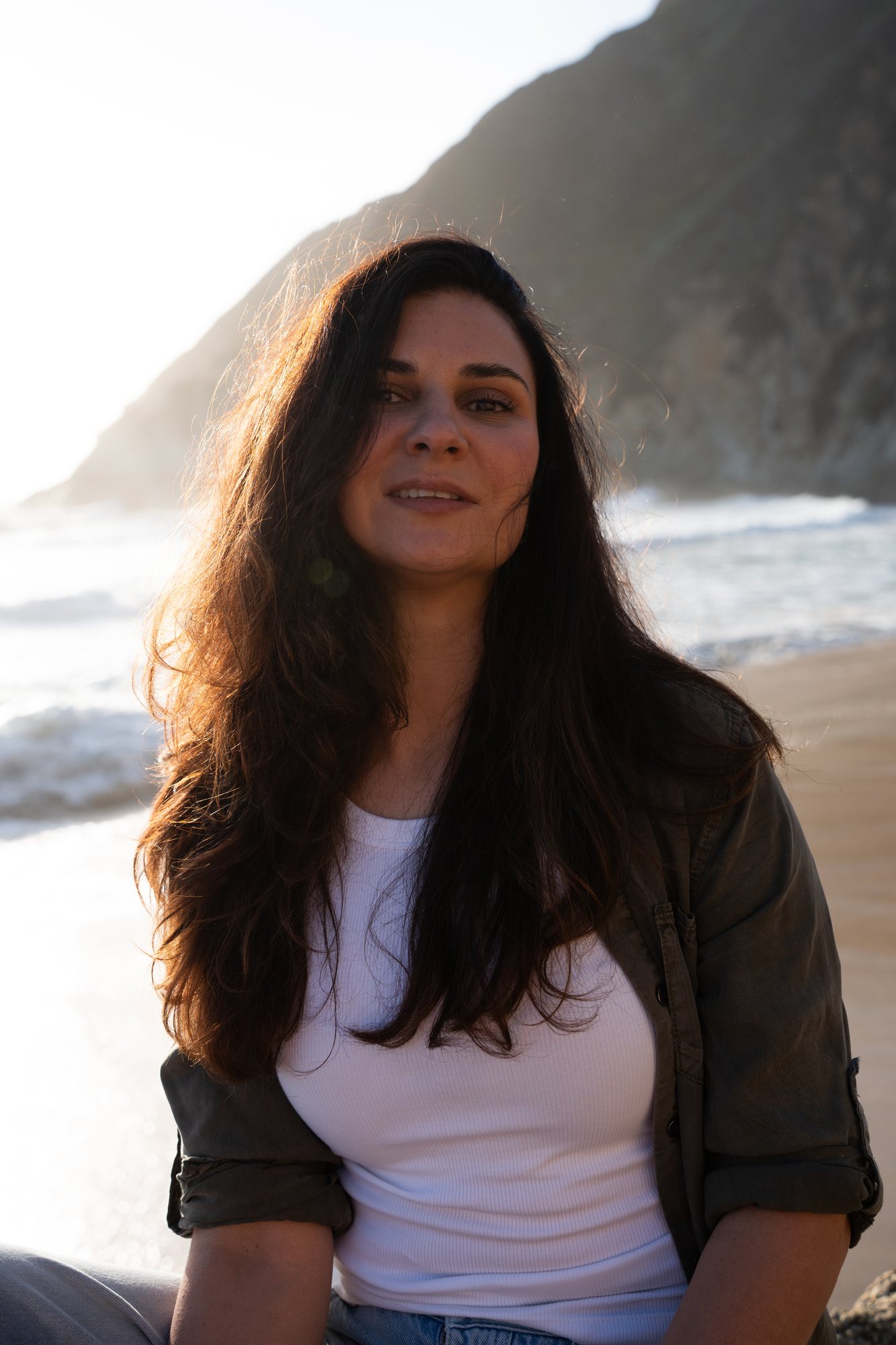 A quiet portrait of the woman by the coast