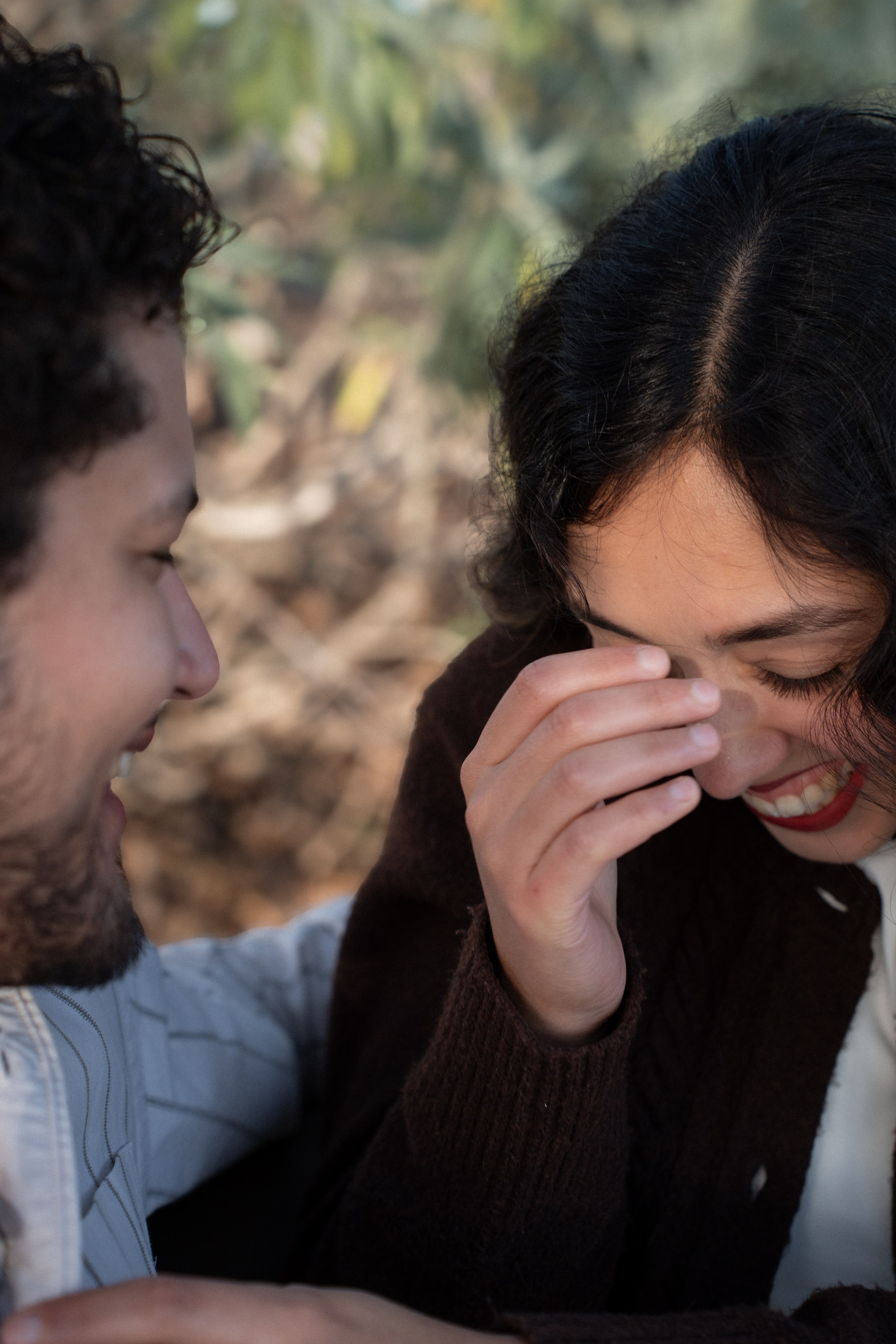 The couple laughing together